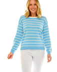 Woman in striped pullover sweater