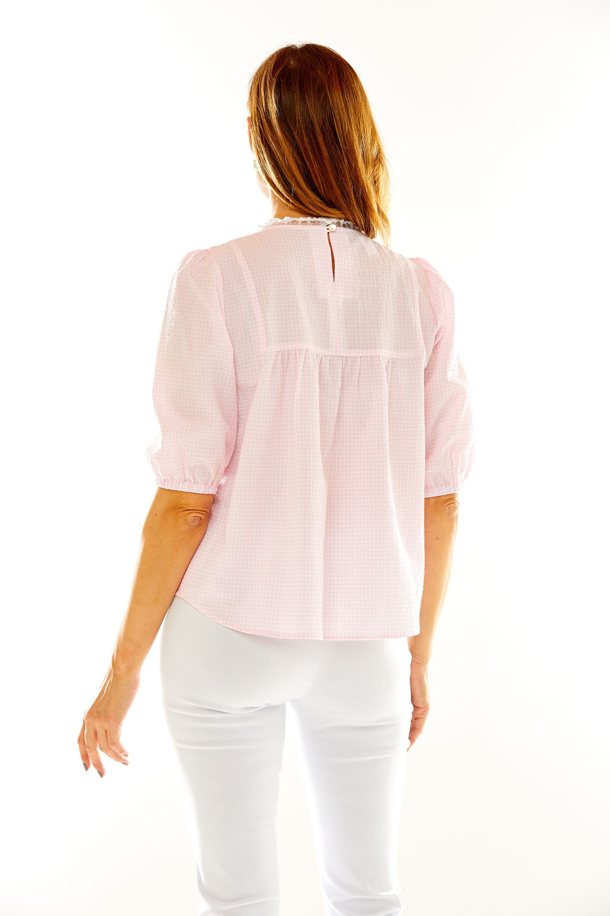 Woman in pink blouse