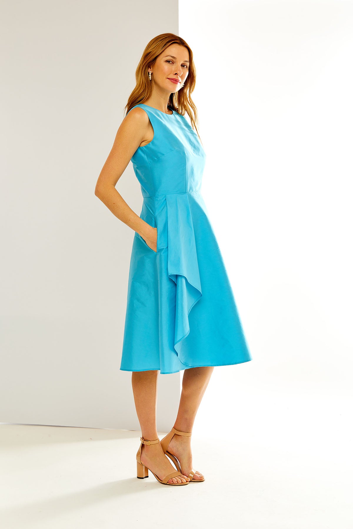Woman in a turquoise dress