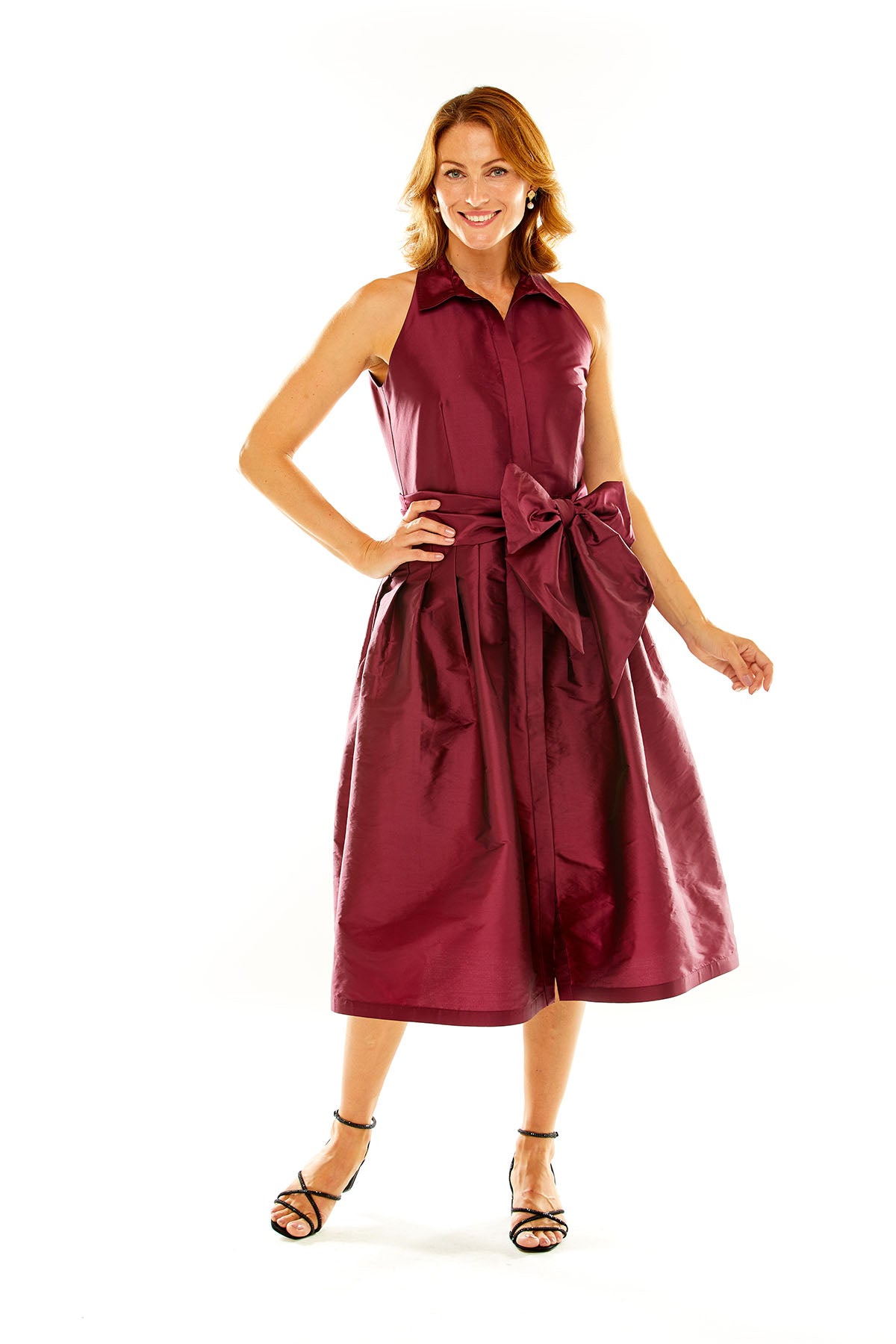 Woman in claret taffeta midi cocktail dress