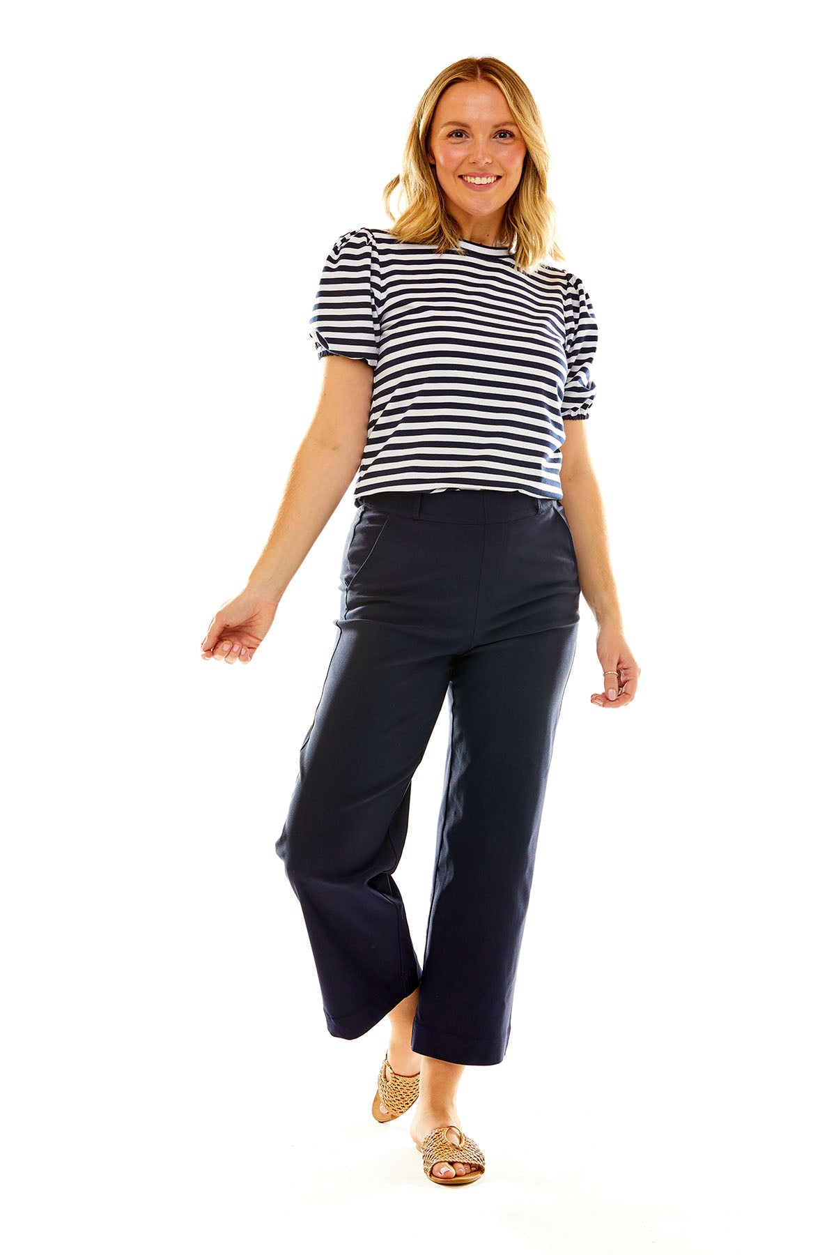 Woman in navy and white stripe blouse