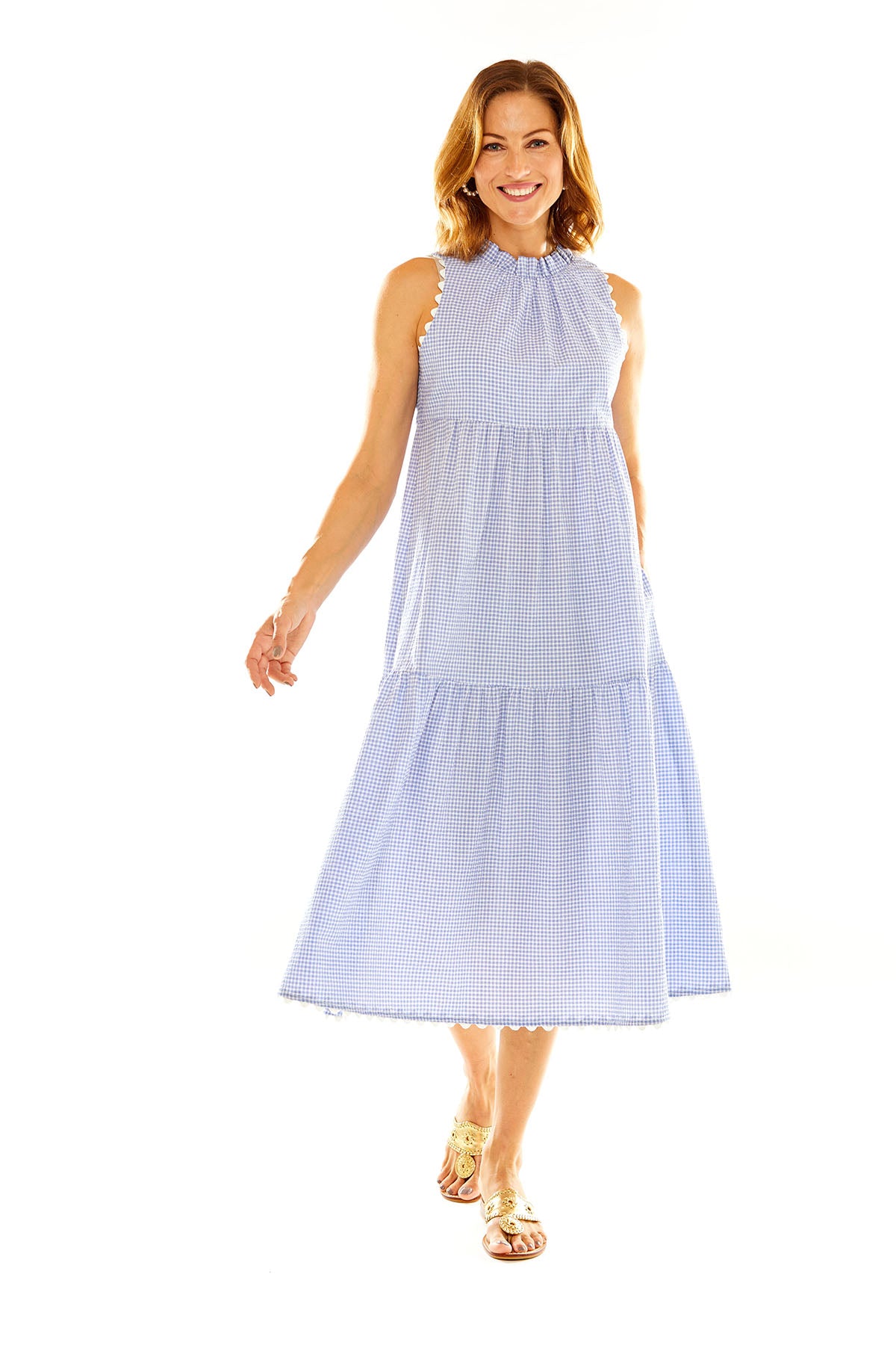 Woman in blue and white gingham midi dress