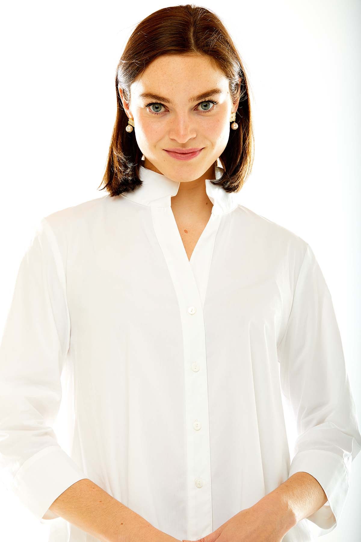 Woman in white tunic