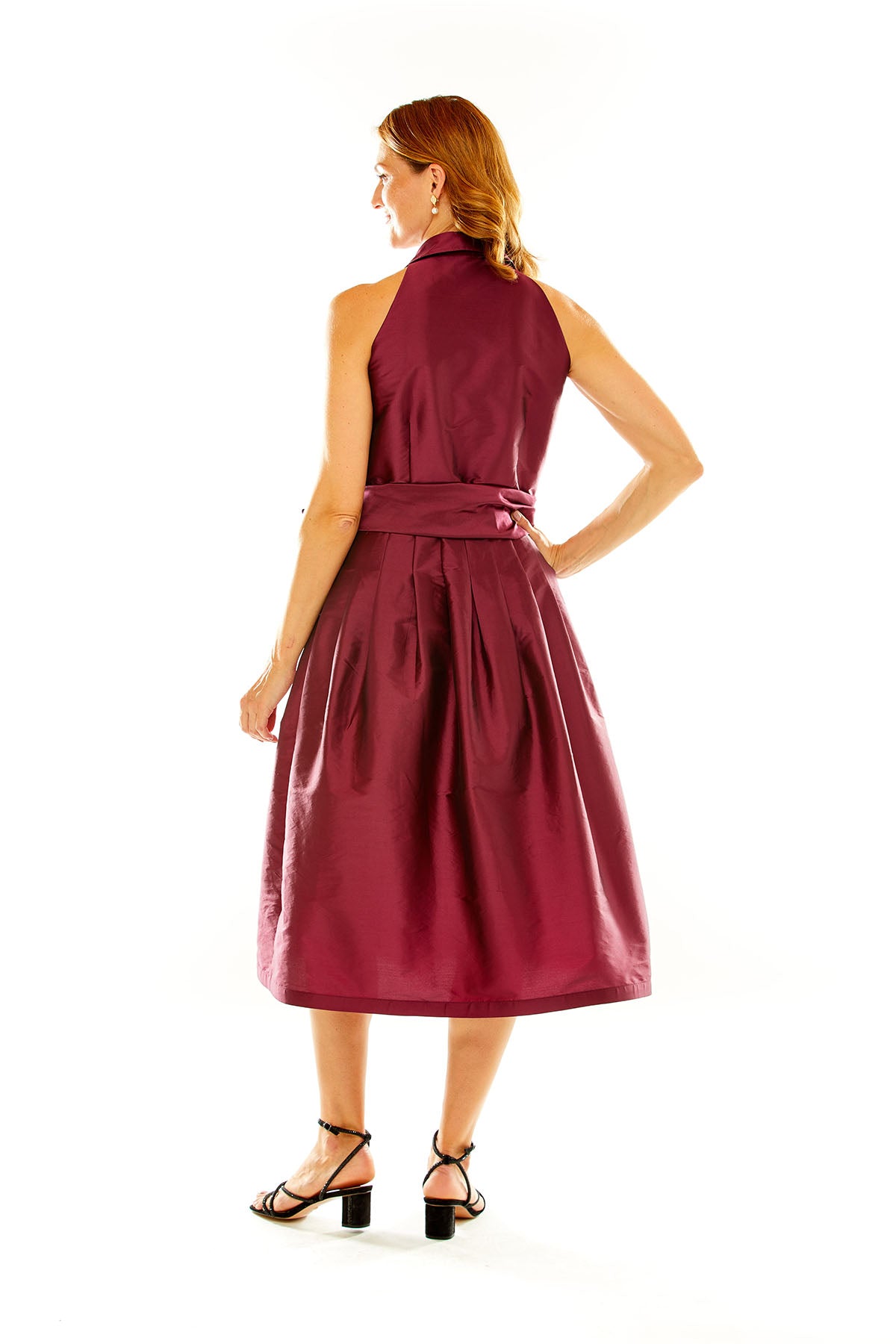 Woman in claret taffeta midi cocktail dress