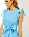 Woman in dress with ruffles
