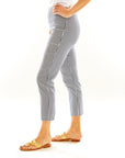 Woman in gingham slim fitting pants