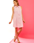 Woman in pink linen dress