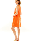 Woman in orange dress