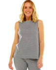Woman in sleeveless gingham top