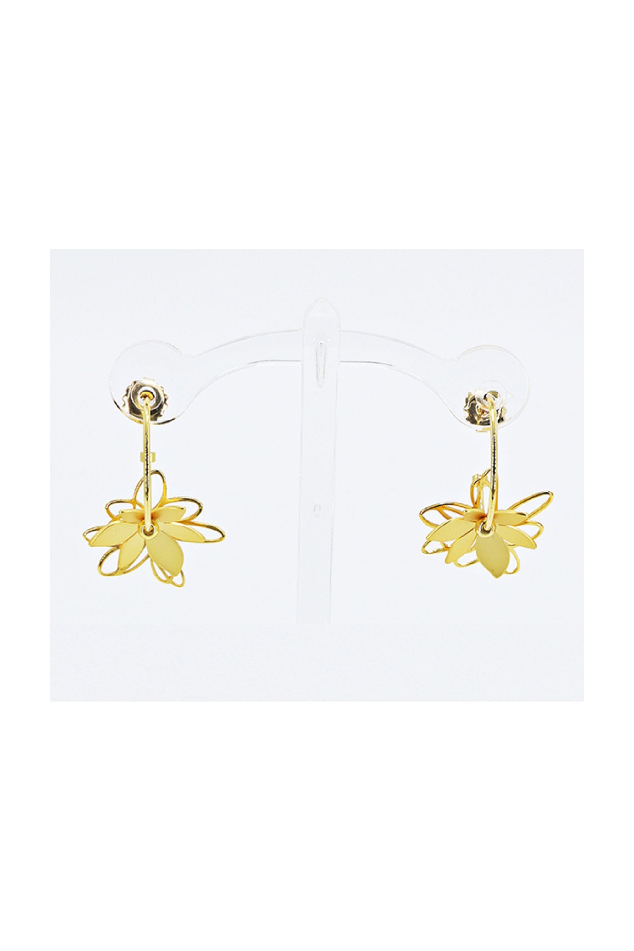 Gold earrings with layered floral design