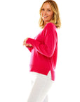 Woman in strawberry v neck pullover